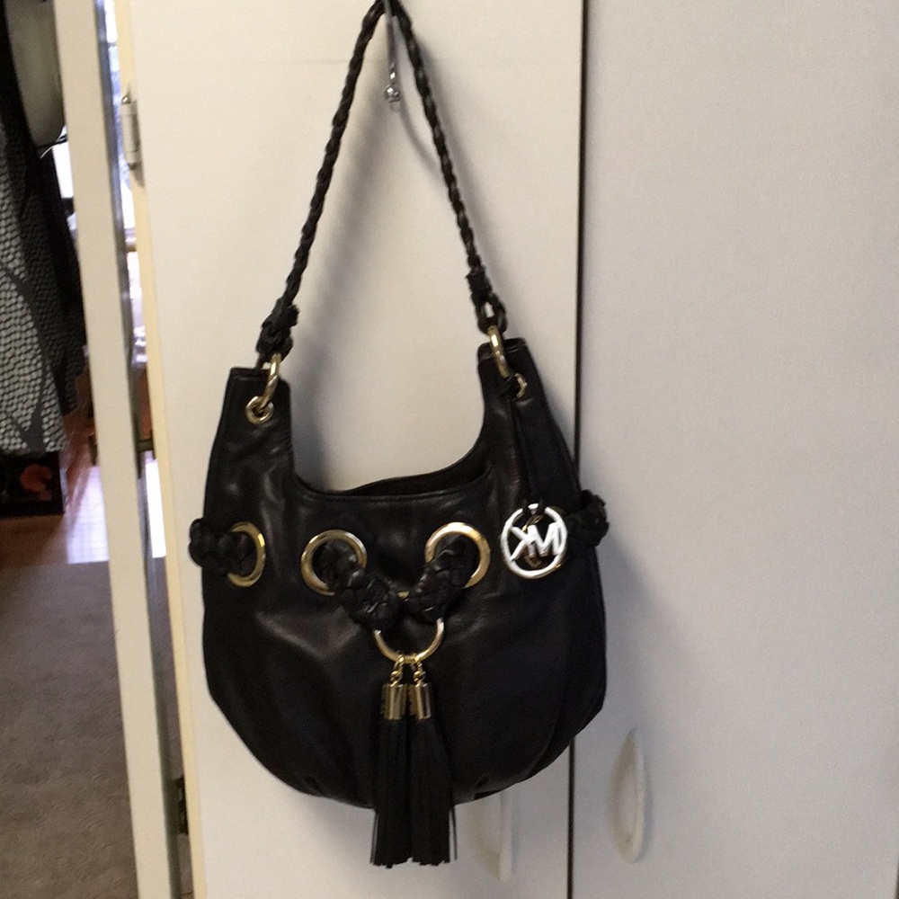 Gently used Michael Kors braided grommet Purse 👛